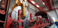 Wir setzen speziell entwickelte Coilmulden für den sicheren Transport von Coils, Metallrollen und schweren Blechen ein.